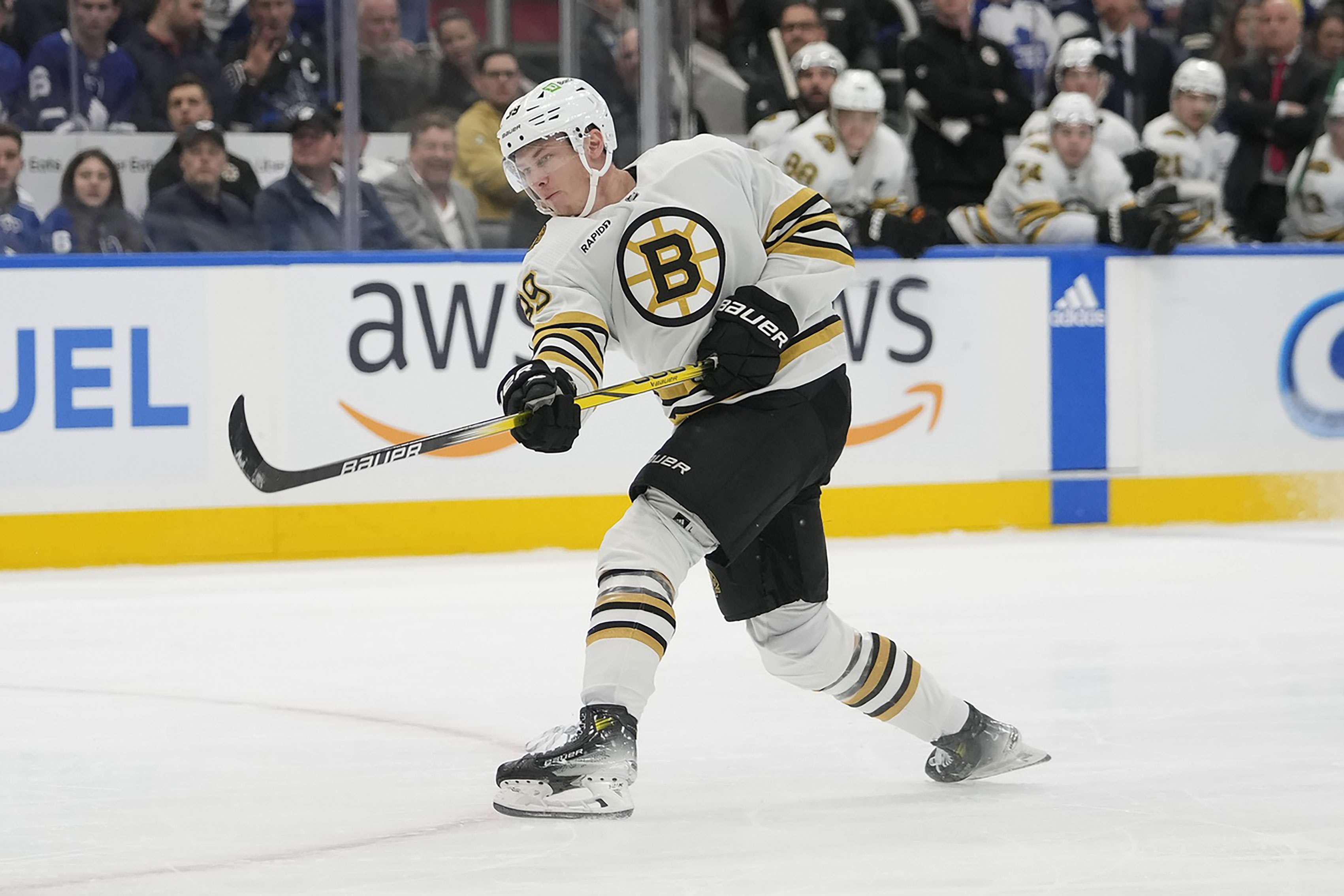 Bruins forward Morgan Geekie (39) shoots the puck against the Toronto Maple Leafs during the second period of game three of the first round of the 2024 Stanley Cup Playoffs at Scotiabank Arena.