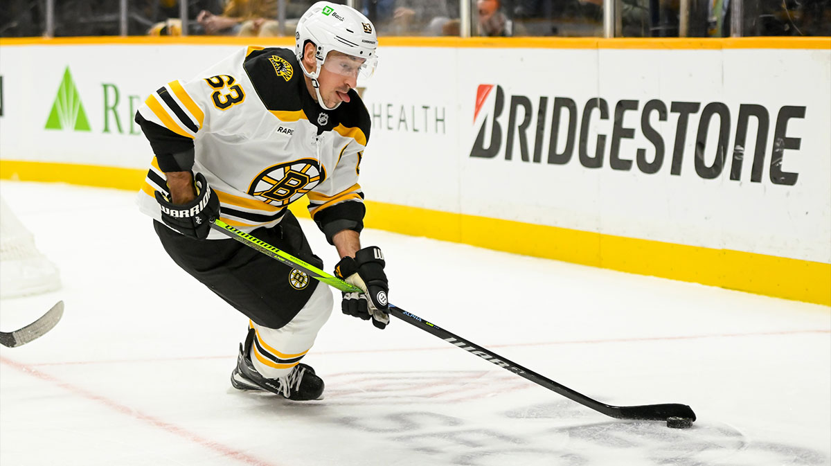 Boston Bruins left wing Brad Marchand (63) skates with the puck against against the Nashville Predators during the second period at Bridgestone Arena.