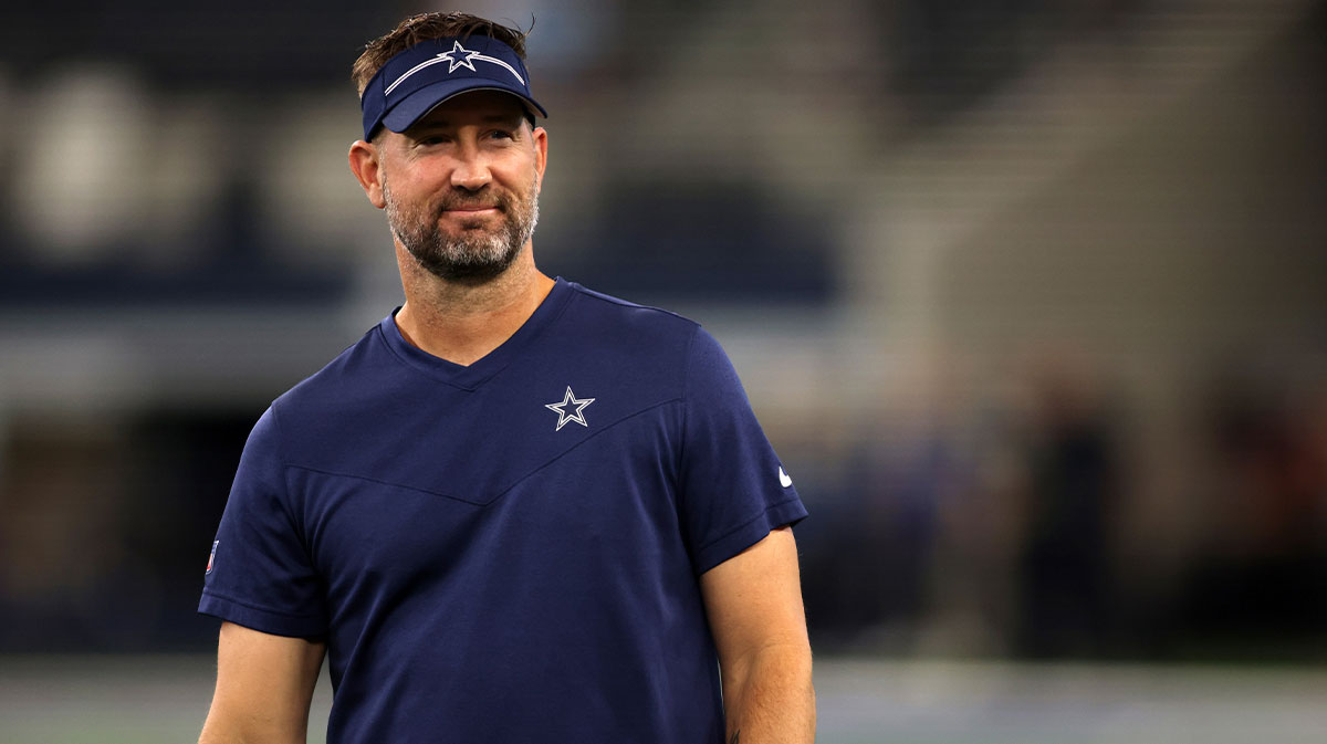 Aug 26, 2023; Arlington, Texas, USA; Dallas Cowboys offensive coordinator Brian Schottenheimer on the field before the game against the Las Vegas Raiders at AT&T Stadium. Mandatory Credit: Tim Heitman-Imagn Images